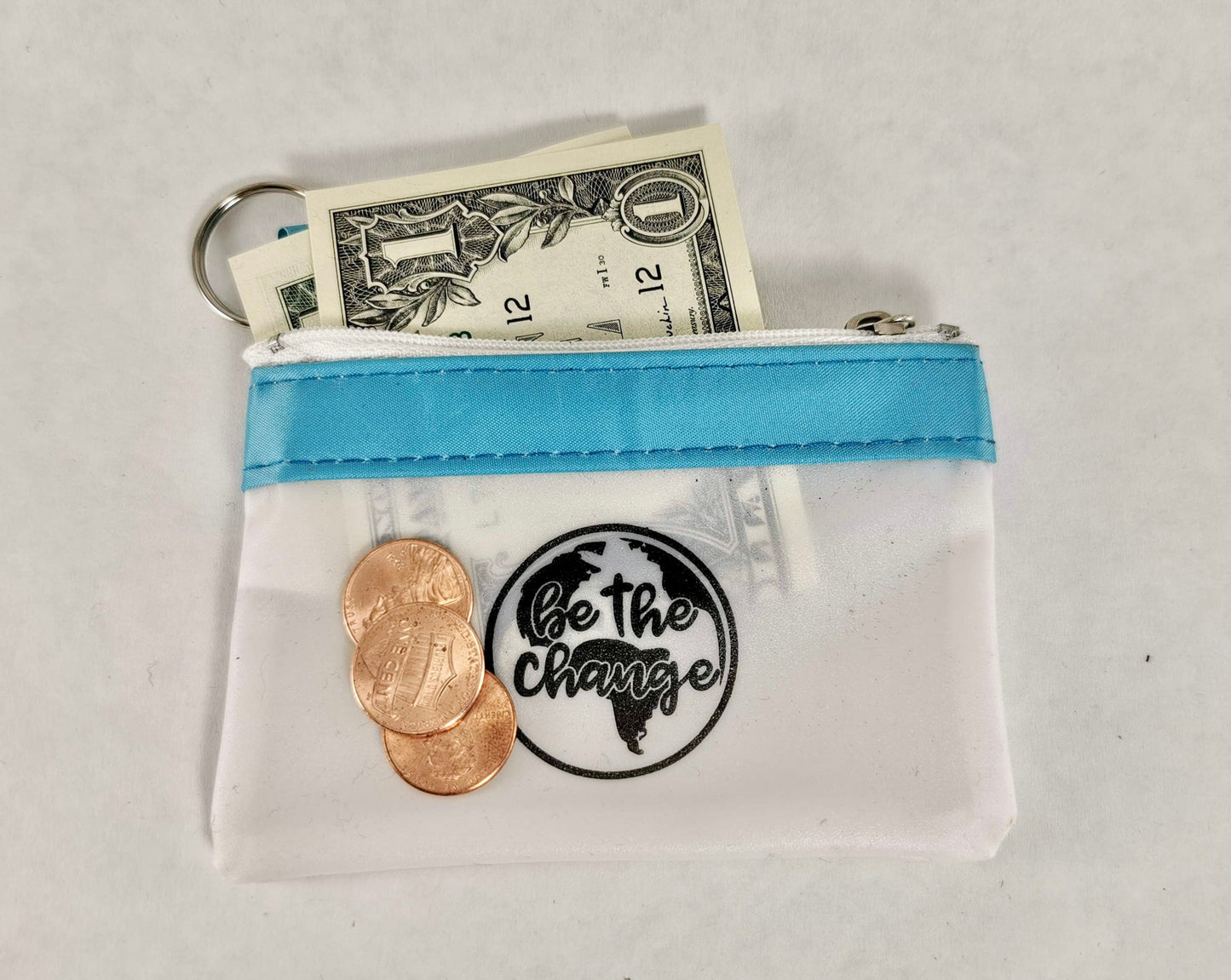 "Be the Change" keychain Zip Pouch
